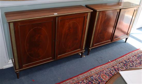 A pair of mahogany two door cabinets W.118cm